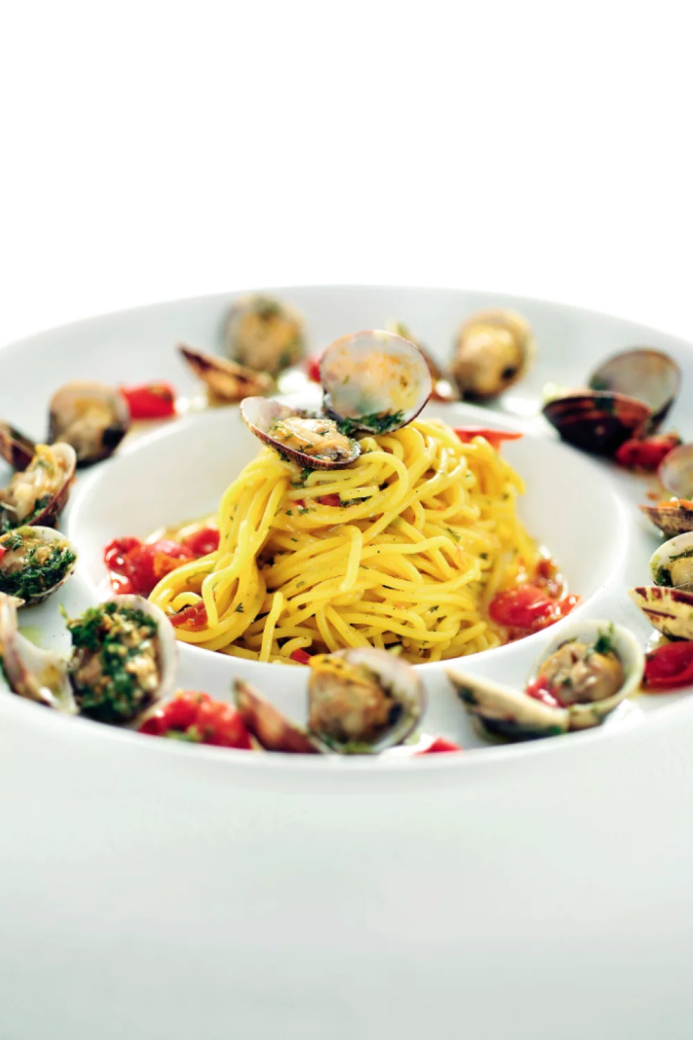 Spaghetti met venusschelpen en bottarga