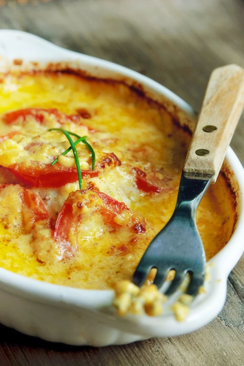 Kabeljauw met cheddar en tomaten uit de oven