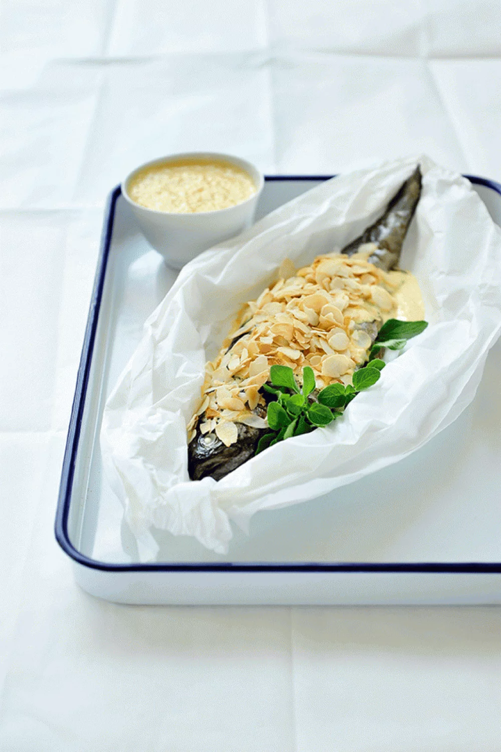 Forel in de oven met witbier en geroosterde amandelschilfers