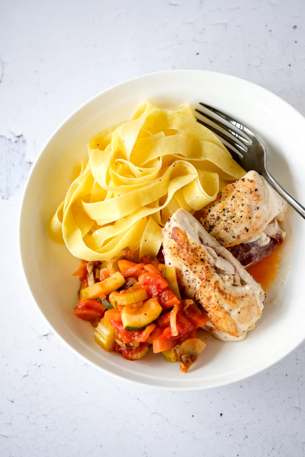 Pasta met kip, ham en mozzarella