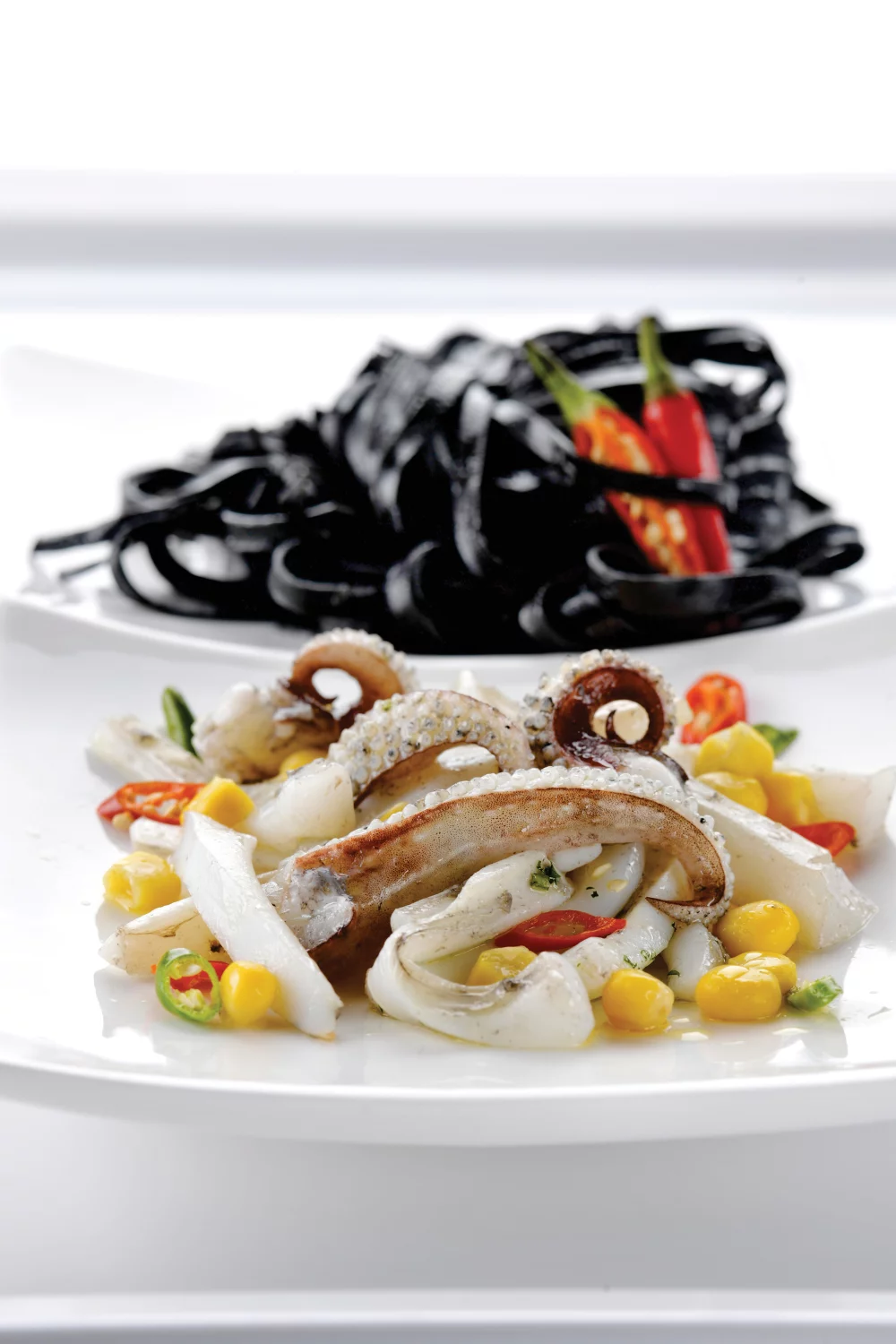 Pasta met krokant gebakken inktvis