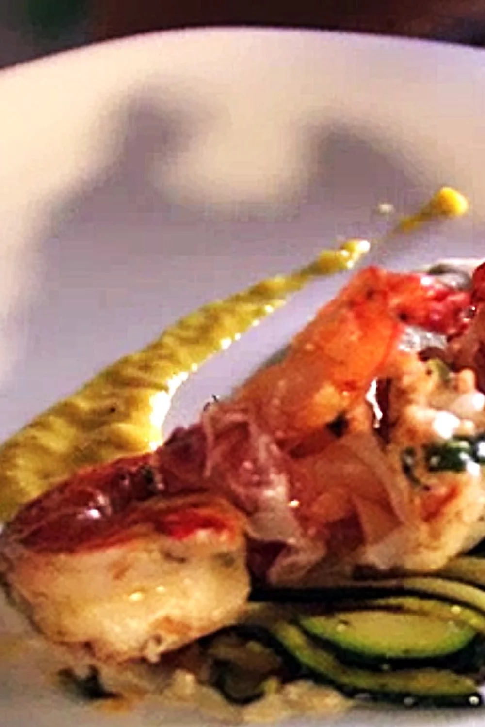 Courgettehapjes met scampi's en ham