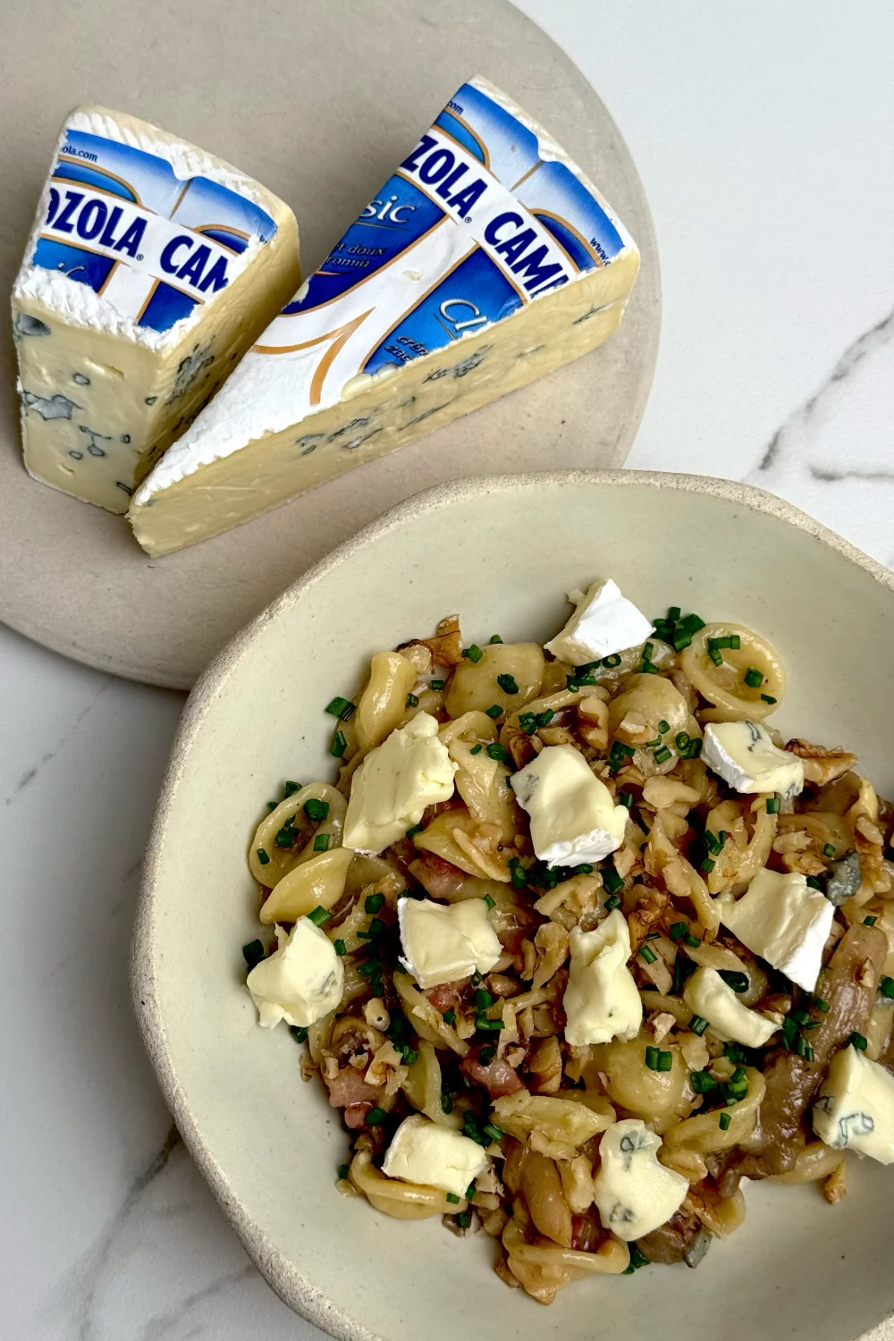 Orecchiette met bospaddenstoelen, pancetta en Cambozola
