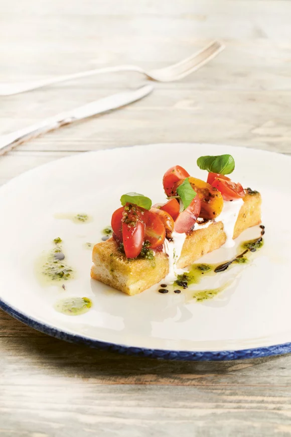 Bruschetta met stracciatellaschuim en kerstomaatjes