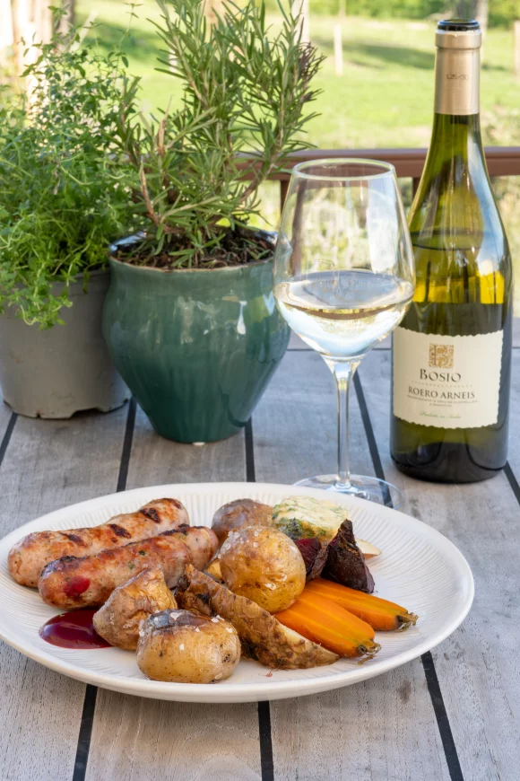 Zelfgedraaide worsten met gepofte groentjes 