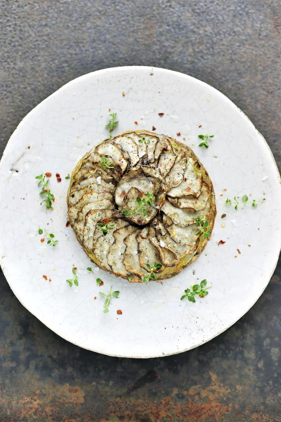 Gratin van aardpeer en aardappel met geitenkaas en tijm
