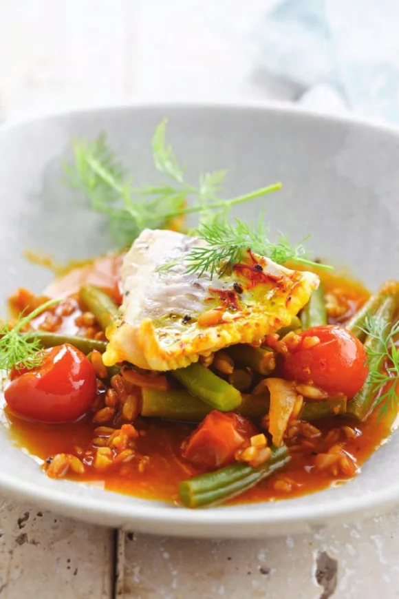 Stoofpotje van spelt en roodbaarsfilet