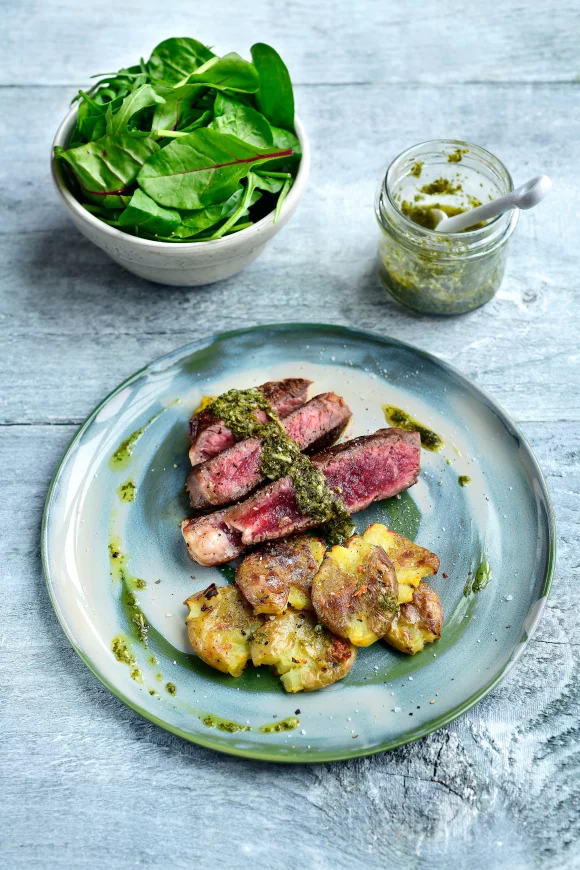 Côte à l'os met smashed potatoes