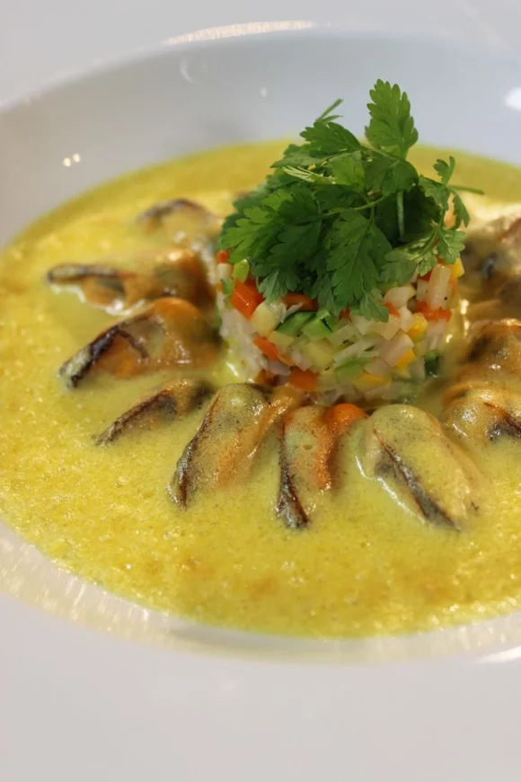 Gratin van mosselen met groentjes en curry