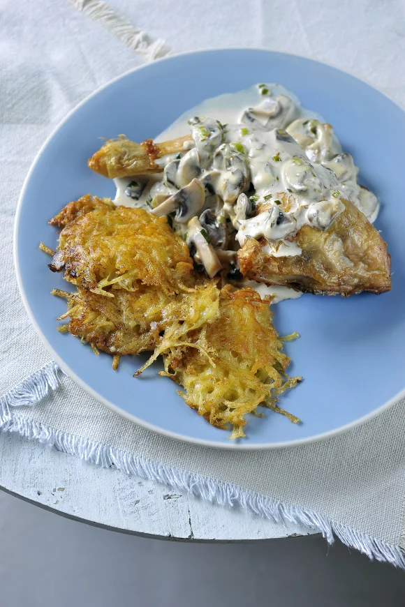 Gevulde kip  met rösti aardappelen en champignonsaus