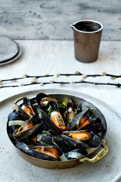 Mosselen met schuimige champagnesaus en dragon